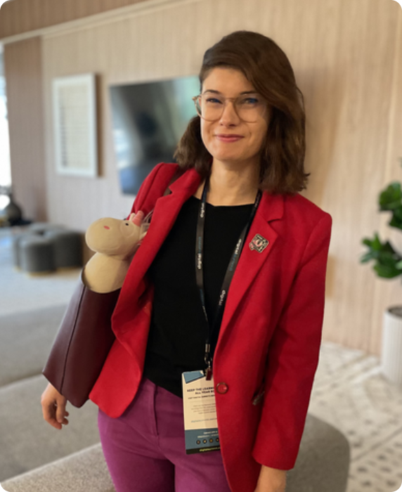 a woman in a red jacket